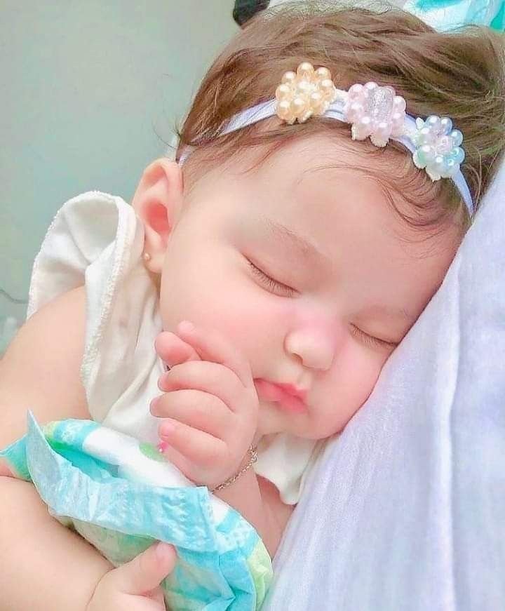 The Serene Charm of Sleeping Angels: Captivating Innocence in Every Photo